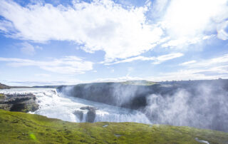 The Gullfoss waterfall in the golden circle of the south of Iceland with lots of water one summer morning